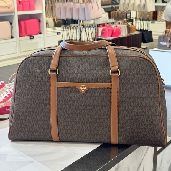 Michael Kors Brown Duffel Bag with Monogram Pattern and Leather Trim - Picture 1 of 7